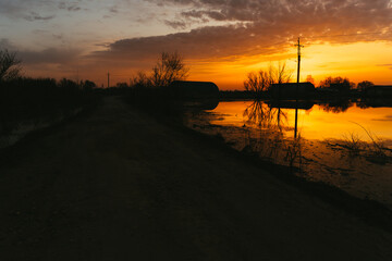 Obraz premium sunset over the river