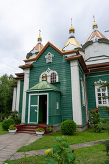 Obraz premium Savior Transfiguration Church in the village of Novaya Mysh, Belarus. A wooden Orthodox church built in 1859 in the pseudo-Russian style.