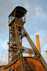 Fototapeta na wymiar Old mining tower in the bright sun
