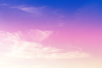 Soft cloud on sky subtle background colorful pastels tone with blue, purple and yellow color. The light of the sun on evening.