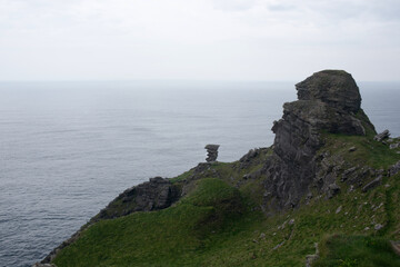 Fototapeta na wymiar Green irish coastline. Cliffs at Moher, Ireland, Europe