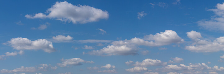 panorama of blue sky with clouds as background