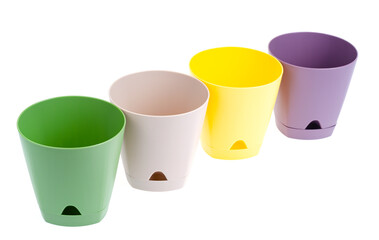 Multicolored plants pots isolated on white background
