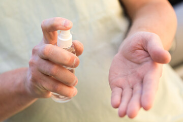 hand disinfection with an antiseptic spray as prevention of coronavirus - Image