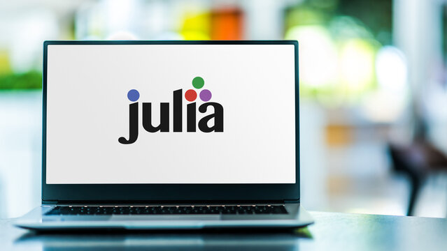 Laptop computer displaying logo of Julia programming language