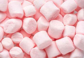 Mini marshmallows of  light pink colors. Selective Focus. Flat lay.