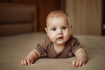 Fototapeta premium newborn, cute, boy, infant, portrait, happy, face, kid, adorable, little, childhood, beautiful, white, small, smile, toddler, human, innocence, smiling, people, eyes, young, life