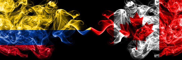 Colombia, Colombian vs Canada, Canadian smoky mystic flags placed side by side. Thick colored silky abstract smokes flags.