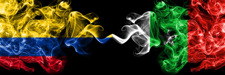 Colombia, Colombian vs Casamance, Senegal  smoky mystic flags placed side by side. Thick colored silky abstract smokes flags.