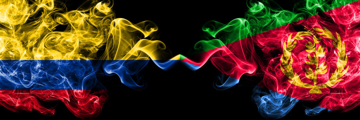 Colombia, Colombian vs Eritrea, Eritrean smoky mystic flags placed side by side. Thick colored silky abstract smokes flags.