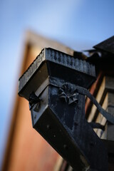 drainage funnel with decorative trim on the downpipe