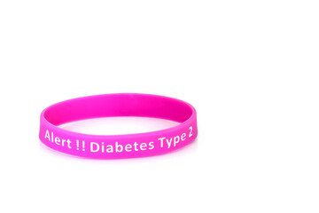 Diabetes type 2 alert wristband in purple rubber silicone on white background.
