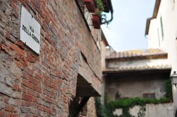 vintage street sign in an old town in Italy