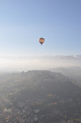 Hot air balloon flying over Italy