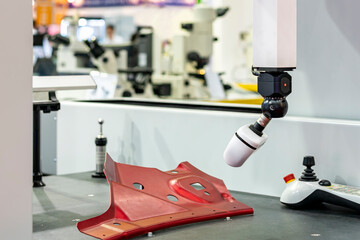 high technology and modern automatic 3d laser scan for measuring or reverse engineering during scan automotive part of industrial manufacture process