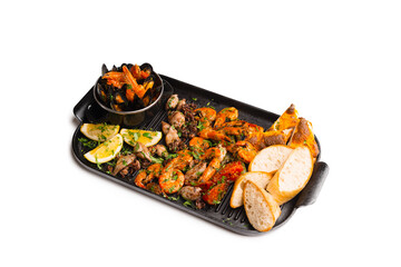 Photo of tasty delicious sea food, shrimps octopus and others with lemon and bread