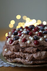 Birthday chocolate cake with mascarpone and cherries