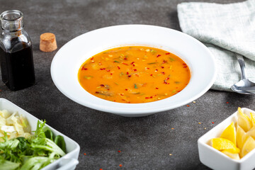 Batirik is a bulgur wheat soup made with roasted peanuts, sesame and vegetables. Served cold with cabbage and lettuce leaves, it is a traditional recipe in the Silifke, Mersin region of Turkey.