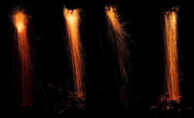 Sparks and embers  falling with flame burning embers