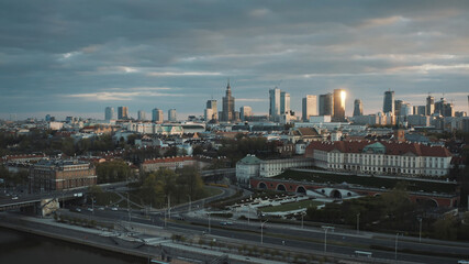 Fototapeta na wymiar Aerial view of Warsaw current urban landscape on bank of Vistula during sunset. High quality photo