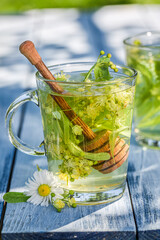 Healthy linden tea with honey. Tea in garden.