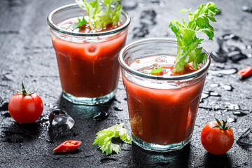 Drink for summer party. Bloody mary with peppers and tomatoes.