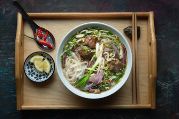 Pho Bo Sot Vang, vietnamese soup with slow cooking beef and rice noodle