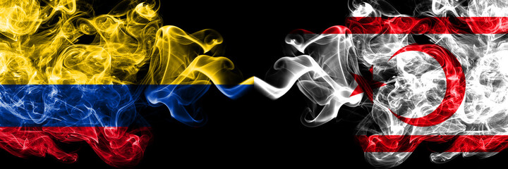 Colombia, Colombian vs Northern Cyprus smoky mystic flags placed side by side. Thick colored silky abstract smokes flags.