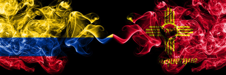 Colombia, Colombian vs United States of America, America, US, USA, American, Albuquerque, New Mexico smoky mystic flags placed side by side. Thick colored silky abstract smokes flags.