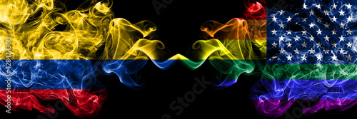 Colombia, Colombian vs United States of America, America, US, USA, American, gay  smoky mystic flags placed side by side. Thick colored silky abstract smokes flags.