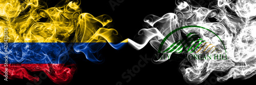 Colombia, Colombian vs United States of America, America, US, USA, American, Morgan Hill, California smoky mystic flags placed side by side. Thick colored silky abstract smokes flags.