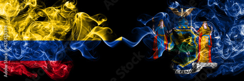 Colombia, Colombian vs United States of America, America, US, USA, American, New York  smoky mystic flags placed side by side. Thick colored silky abstract smokes flags.