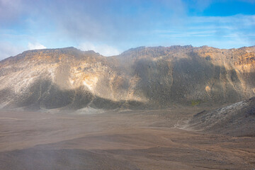 Slopes, light and shade on hillsides of mountains along Tongariro Alpine Walk