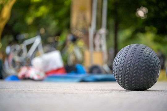 Closeup Of A Slamball On The Ground In A Park With A Blurry Background