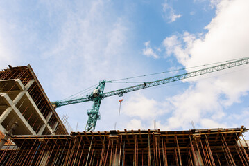 Fototapeta na wymiar urban constructions, crane when building
