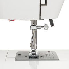 Sewing machine for sewing clothes from fabric on a white isolated background. Front view