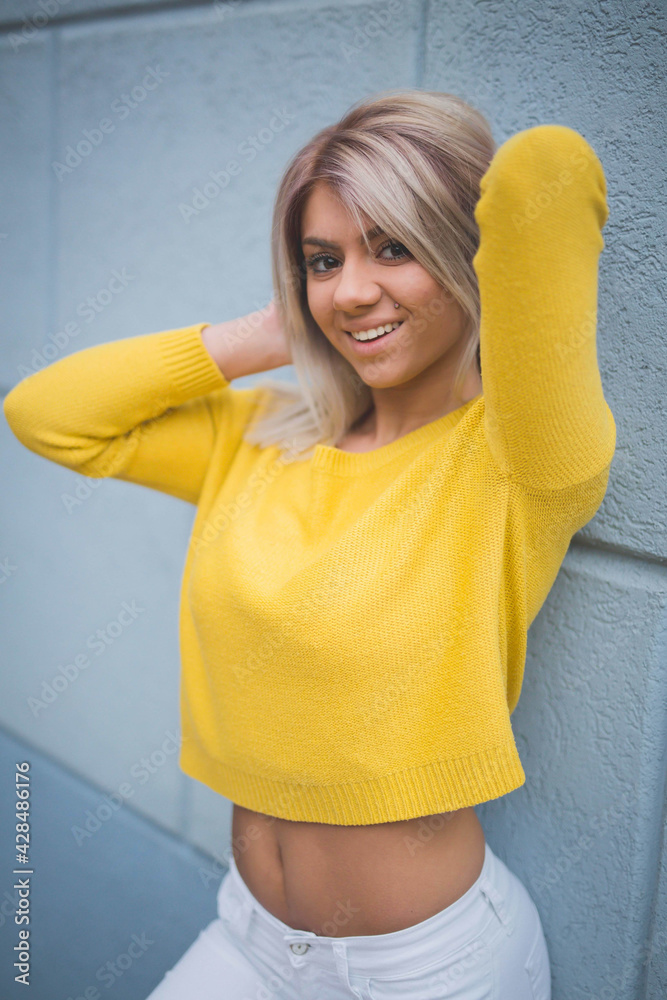 Poster shallow focus shot of an attractive bosnian female posing for the camera