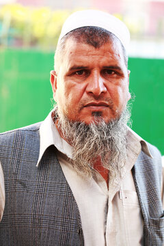 Serious Pakistani Pathan Muslim Man With Beard And Cap