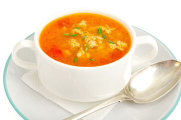 Thick homemade vegetable soup with rice, pumpkin and tomatoes