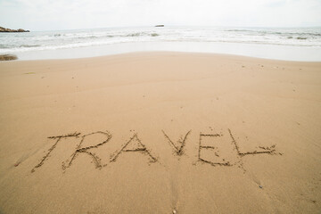 Words written on the sand on the beach