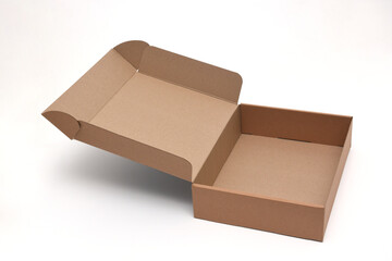 Brown cardboard transformer box with open lid on white background