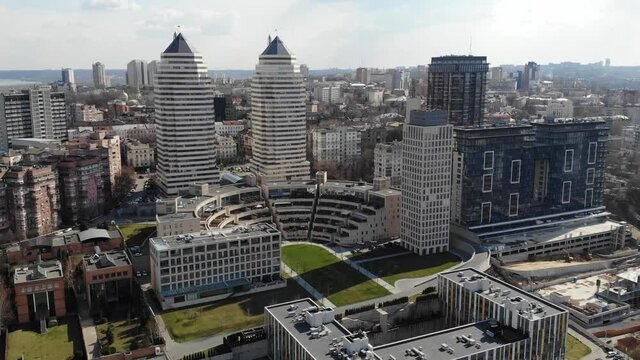 Urban aerial view of Dnipro city residential area. Downtown flight footage. Towers, skyscrapers (Dnepr, Dnepropetrovsk, Dnipropetrovsk, Dnieper). Ukraine