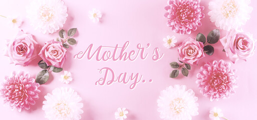 Fototapeta na wymiar Happy mothers day concept, Vintage style of pink roses and beautiful flower frame on pastel background with the text. Flat lay ,top view.