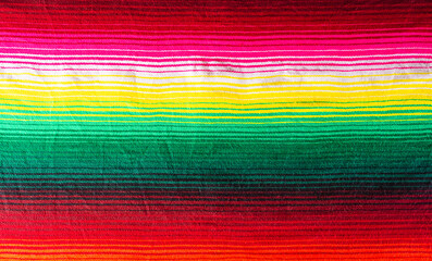 Cinco de mayo background decorated image made from mexican blanket stripes or poncho serape background.