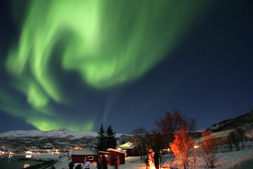 Nice polar lights shot over the town in winter