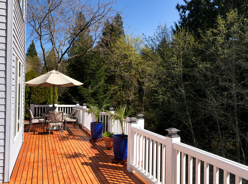 Home outdoor deck freshly painted during nice spring day