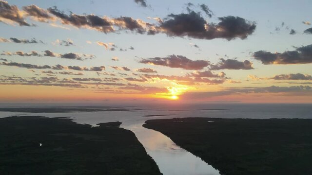 Aerial high hyper lapse of sunset in amazon river 4K timelapse