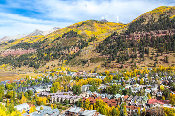 Obraz premium Telluride Colorado Condos - Aerial view of west end condos in Telluride Colorado with the San Juan Mountains in the background on a fall afternoon
