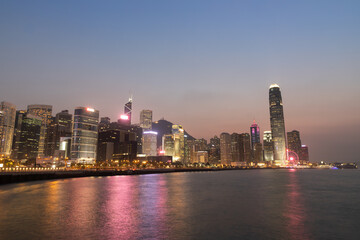 Colorful magnificent Night city view of Central, Hong Kong, photo from Wan Chai promenade, Victoria Harbour, Hong Kong