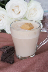 cup of cappuccino with chocolate